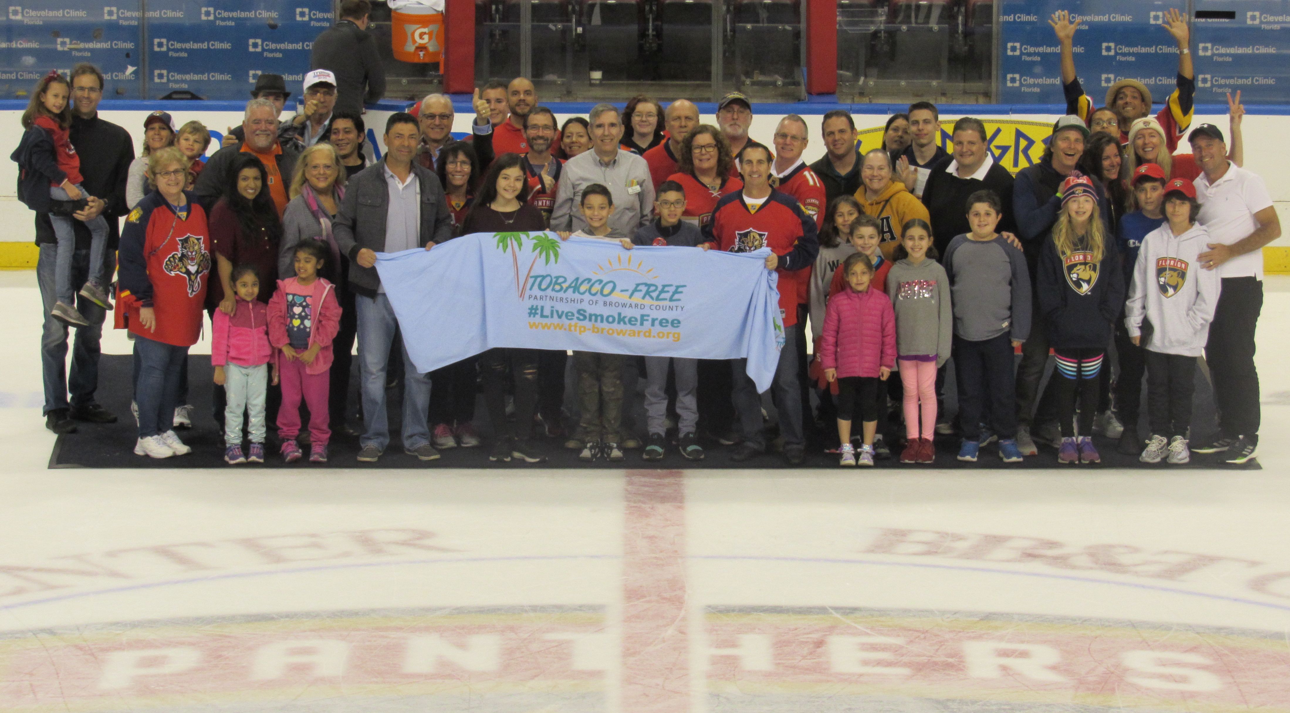 Winners of the Tobacco Free Art Contest with members of the Tobacco Free Partnership at the
fifth Tobacco Free Hockey Event